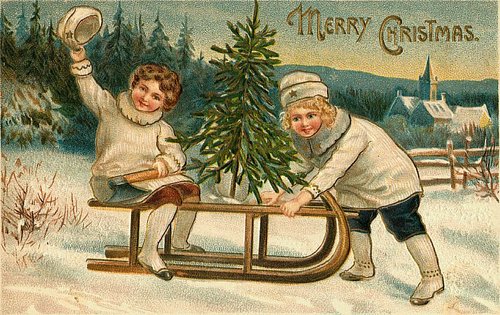 Victorian Christmas Card: Children with Christmas Tree on Sled in Snow