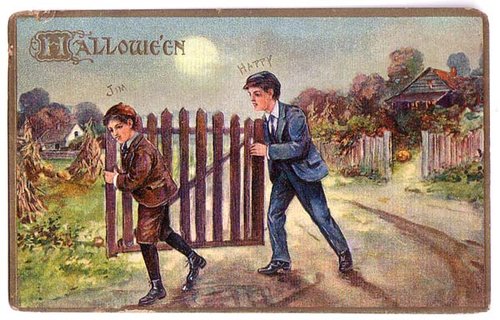Vintage Halloween Greeting Card: Boy Pranking Gate, Edwardian Era